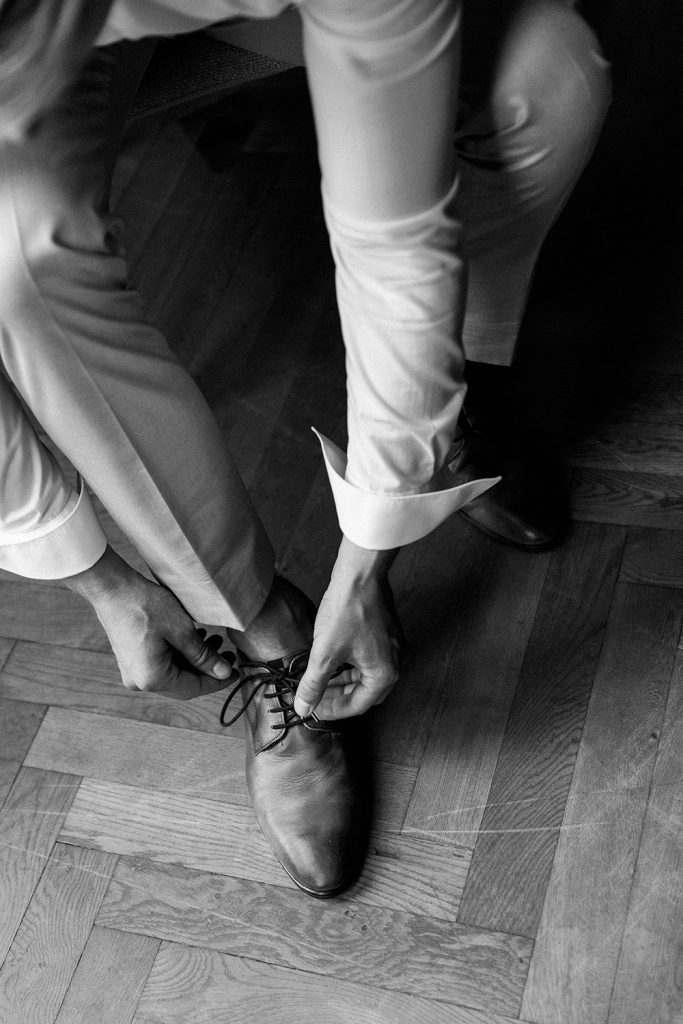 wedding photographer in Europe getting ready groom