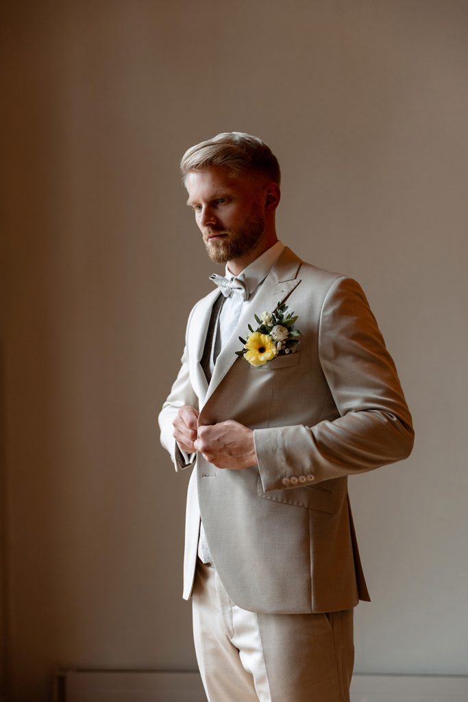 wedding photographer in Europe groom getting ready