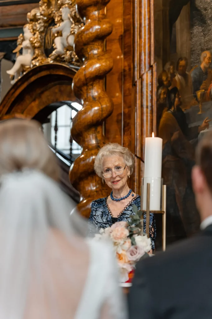 the bride´s grandmother speaks during the wedding ceremony